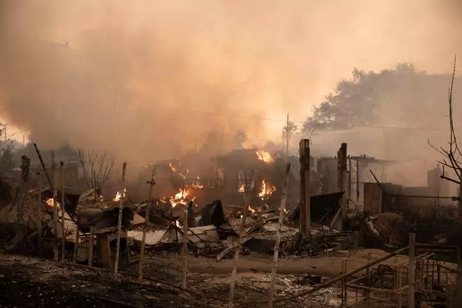 California wildfires surge, fuelling estimated losses over  billion