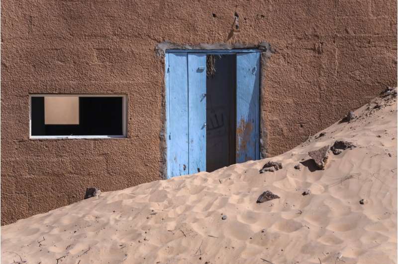 An encroaching desert threatens to swallow homes and history