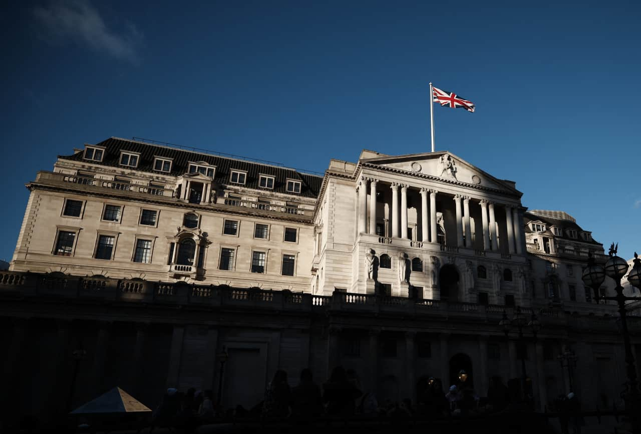 Bank of England cuts rates by a quarter-point as two voted for jumbo reduction