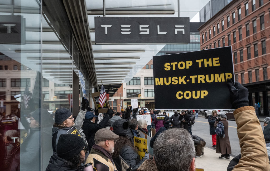 Protesters demonstrate outside Tesla showrooms in US